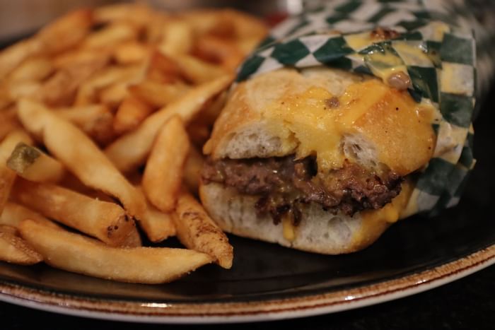 Philly Cheese Steak served with French fries at Hotel Halifax