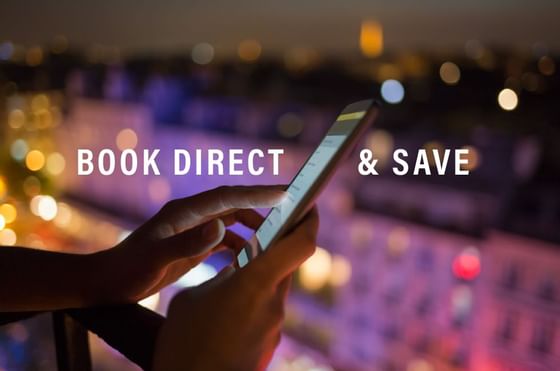 Book Direct & Save poster with person using the phone on a balcony background at The Grace Sydney