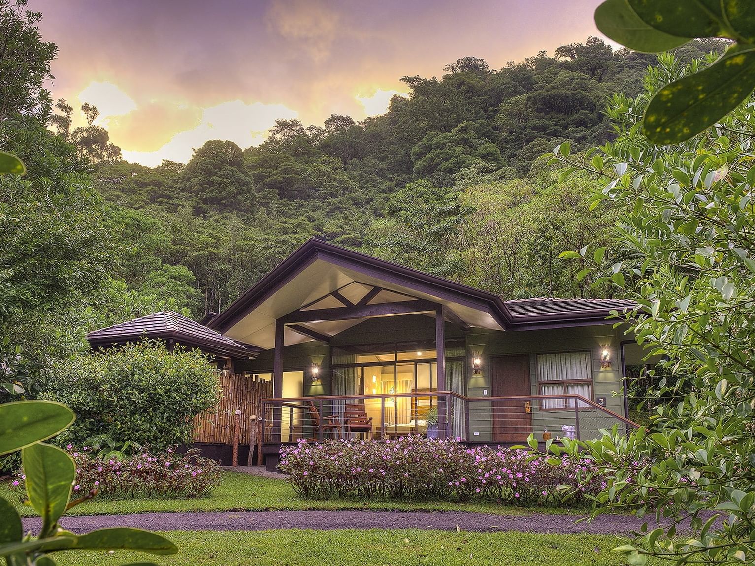 exterior of bungalow with mountains in background