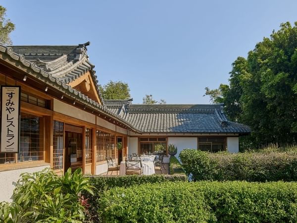 Traditional Japanese-style restaurant building with outdoor seating at Hotel Sumiya Cuernavaca