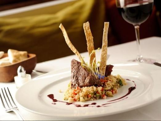 vibrant beef dish with nice plating at NOI Casa Atacama Hotel 