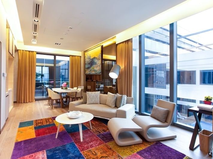 Dining & lounge area in The Peony Villa at One Farrer Hotel