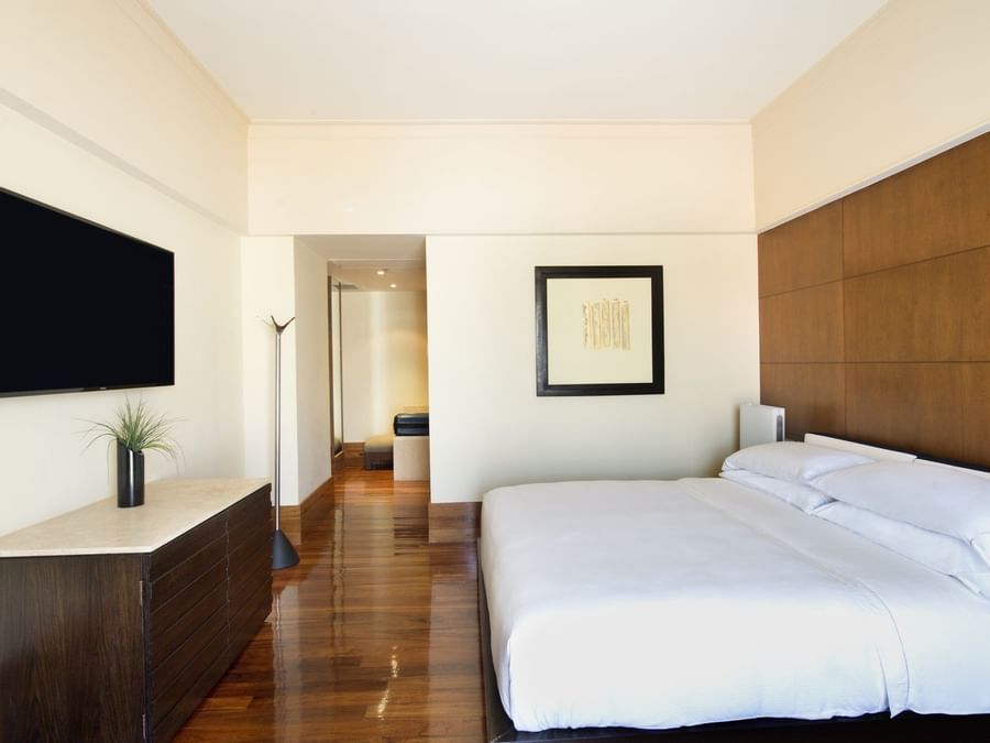 TV, King bed & Painting in Presidential Suite at La Colección