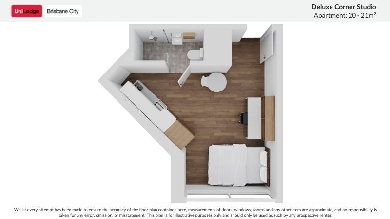 Floor plan of a Deluxe Corner Studio Apartment with a bed, kitchen, and bathroom.