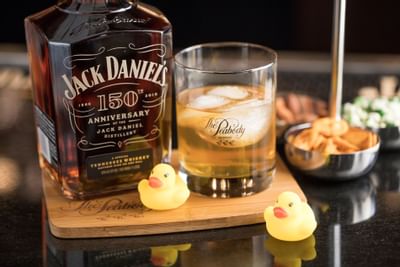 Jack Daniel's bottle and rubber ducks at Peabody Hotels