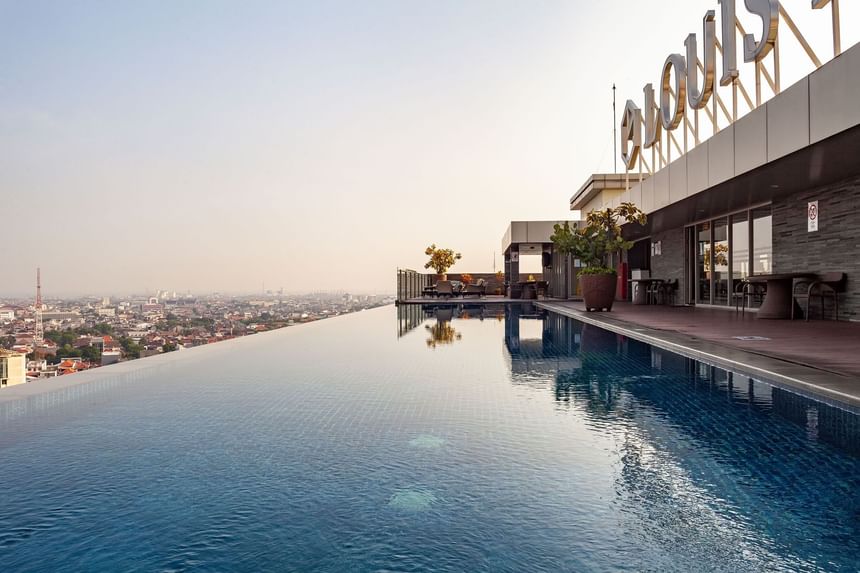 Rooftop infinity pool area at LK Hotel Simpang Lima