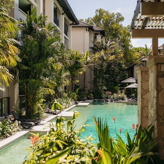 Outdoor pool area at Pullman Palm Cove Sea Temple Resort & Spa