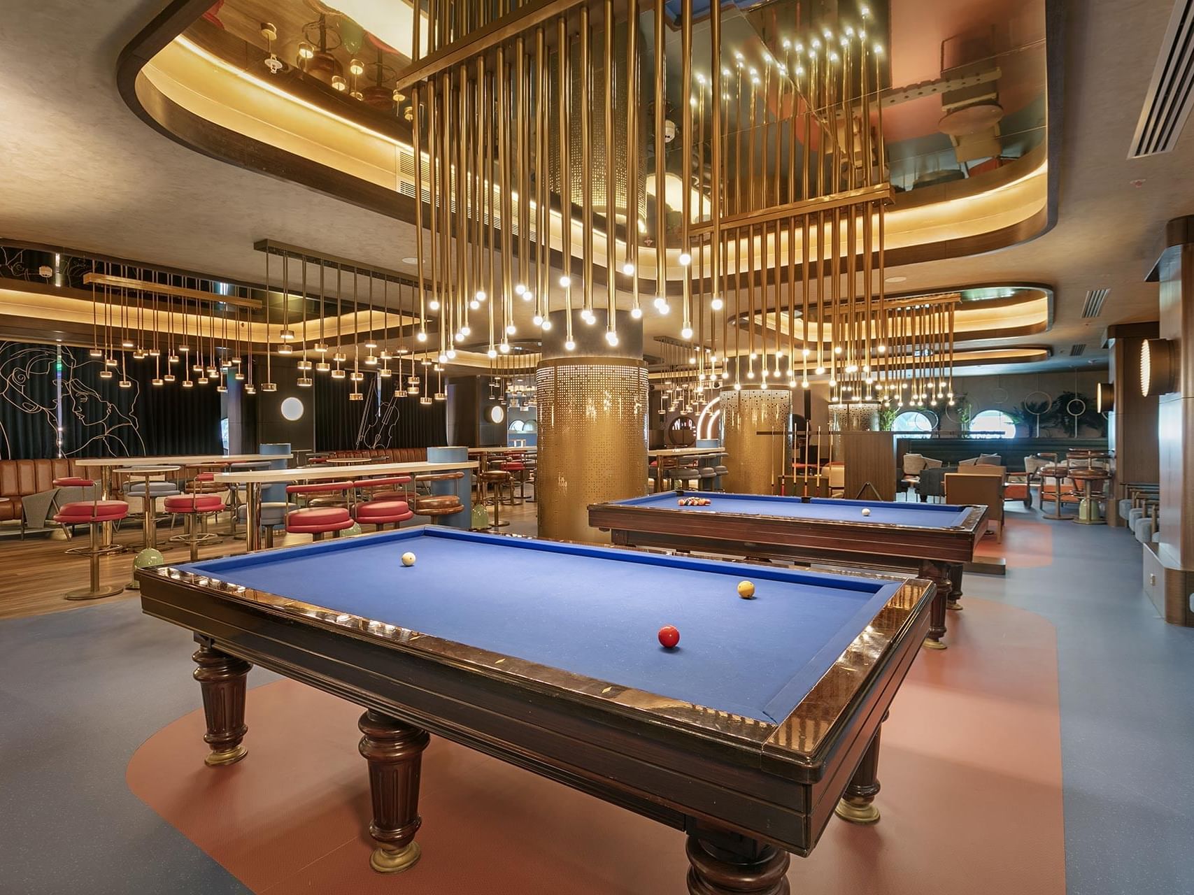Pool board tables arranged with pool balls in Game Center at Titanic Deluxe Lara