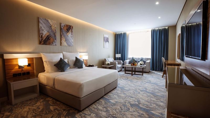 Spacious Executive Suite with a TV at Cantonal Hotel by Warwick Riyadh