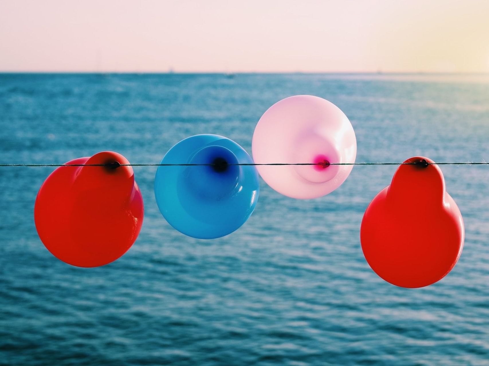 4 balloons over Sea View during Daytime at The View Eastbourne