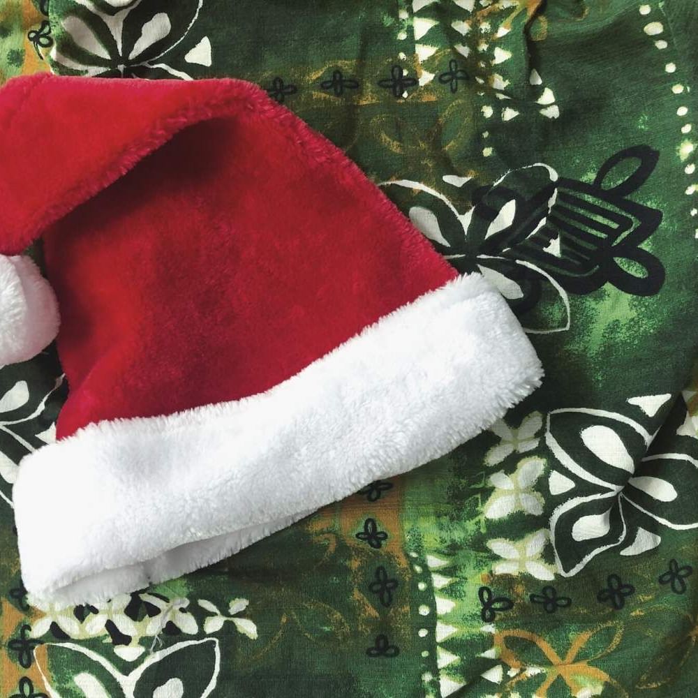 Close-up of a Christmas hat on a mat at Waikiki Resort Hotel by Sono