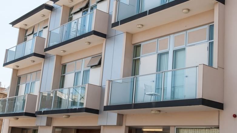 Street view_Student Living City West complex featuring secure car parking on ground floor