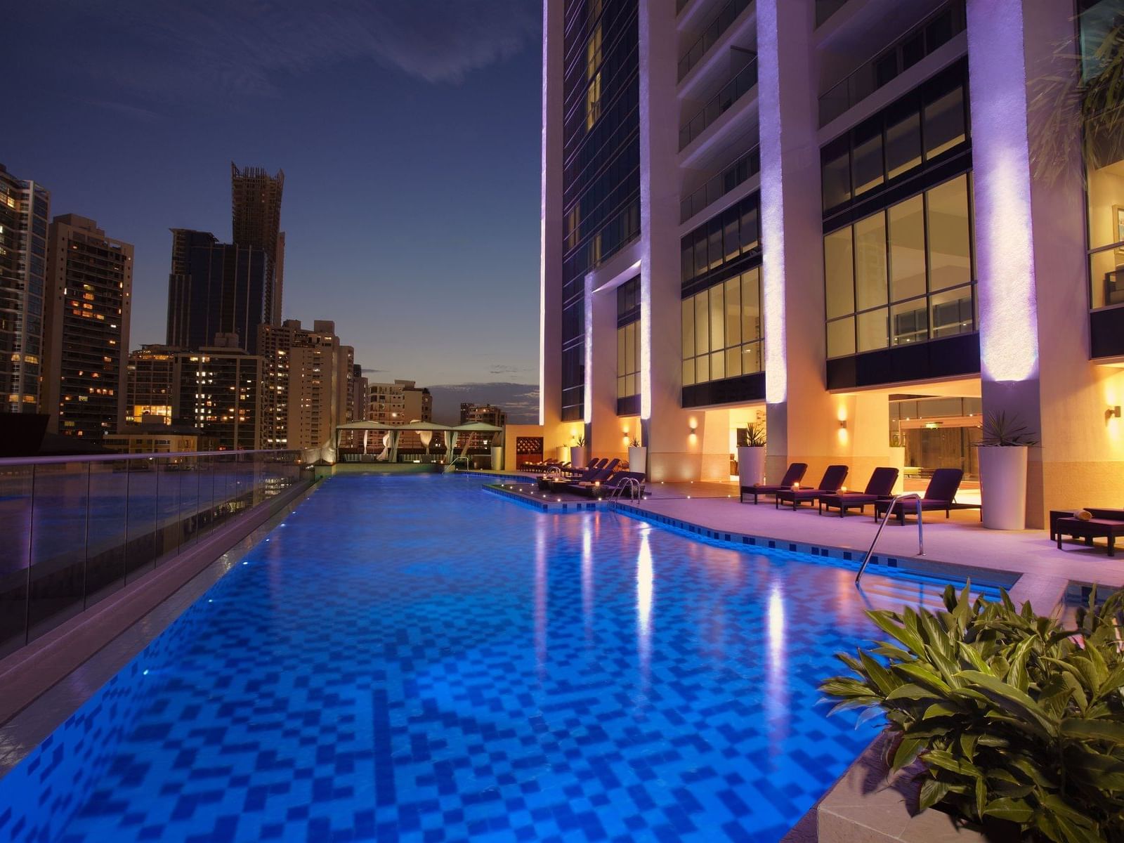 Outdoor pool area with sunbeds in Float Bar at Megapolis Hotel Panama