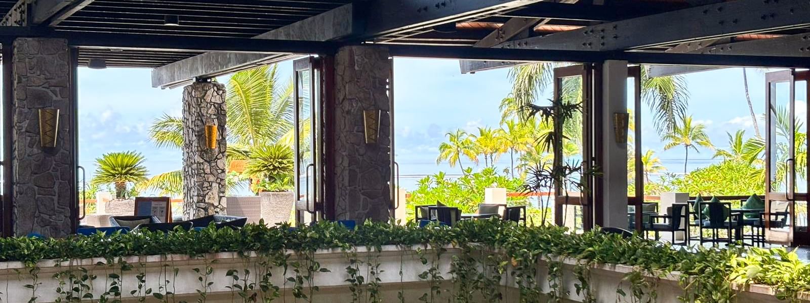 View of the Sunset Terrace Bar with ocean view at Warwick Fiji Resort and Spa in Korolevu