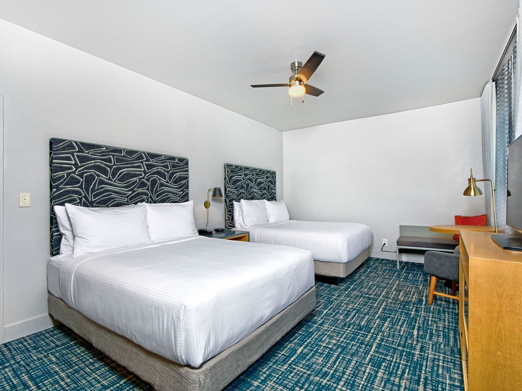Beds with TV, Courtyard Double Queen Room, The Garrett Hotel