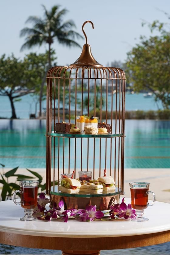 Tea & Snack's stand on an outdoor table at The Danna Langkawi