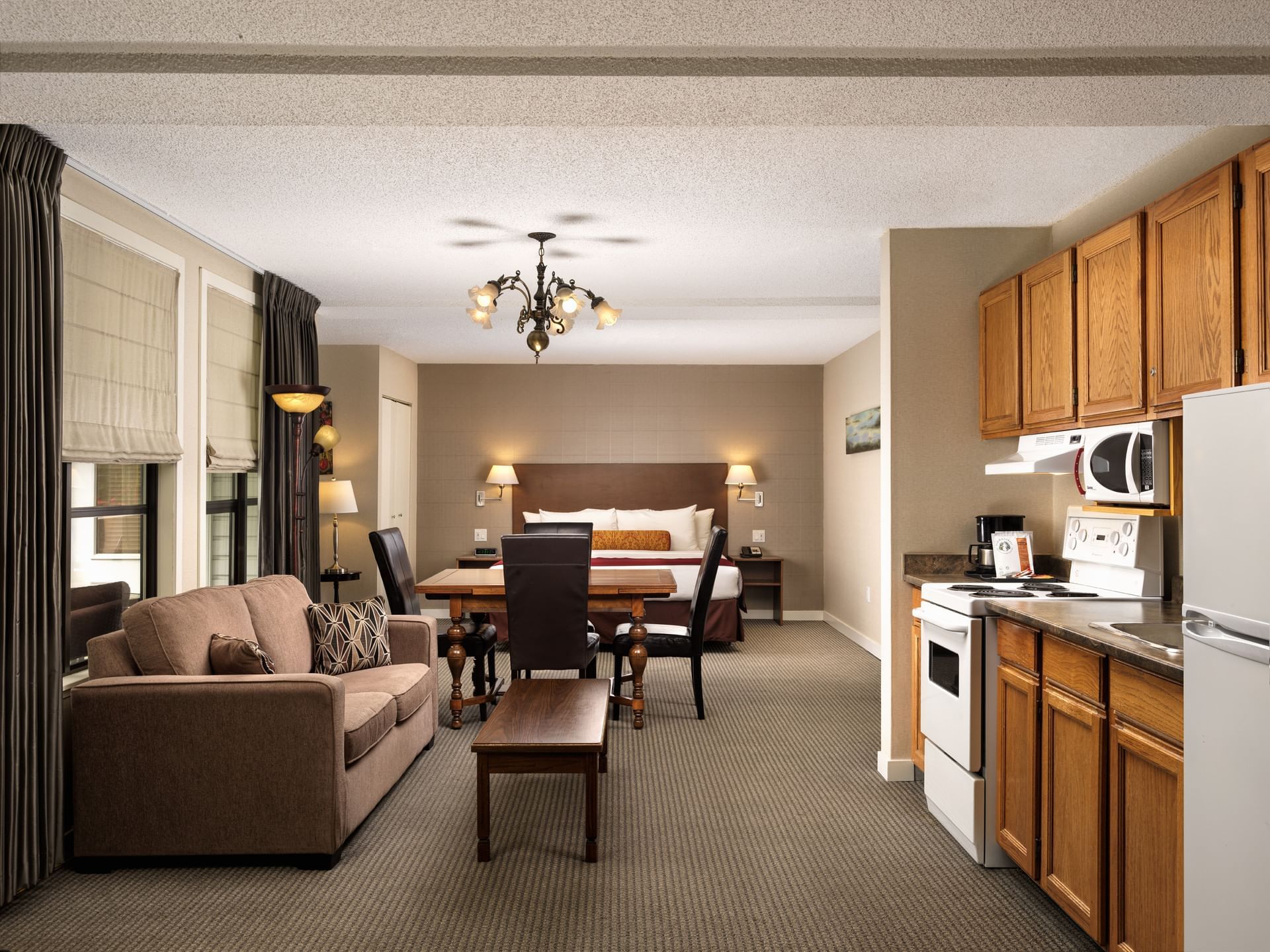 Elegant living room with interior & amenities in Balmoral Room at Huntingdon Manor