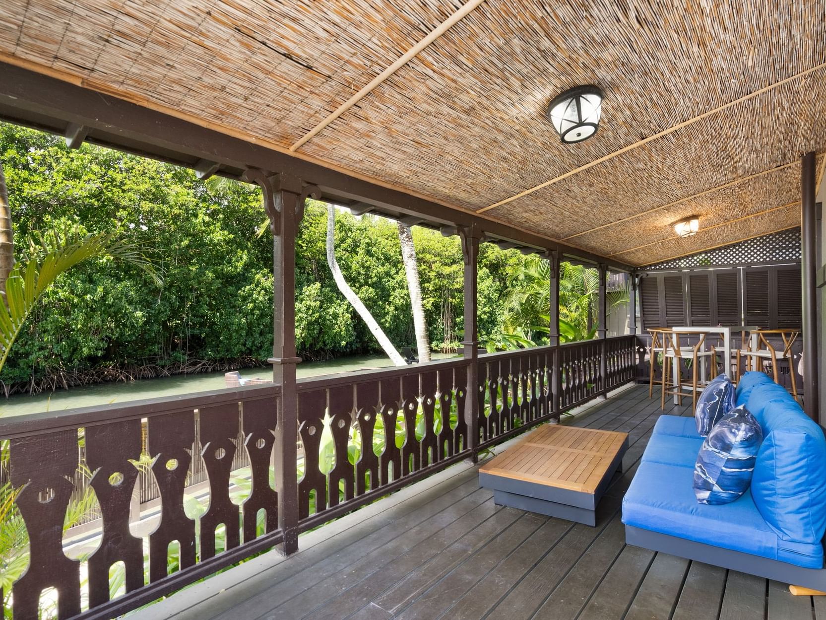 Balcony lounge area in Two-Bedroom Suite at Paradise Bay Resort