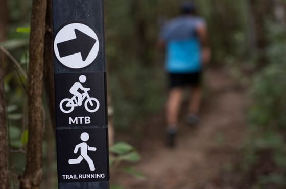 Mountain Trail Biking & Trail Running sign board at Hotel Rio Perdido