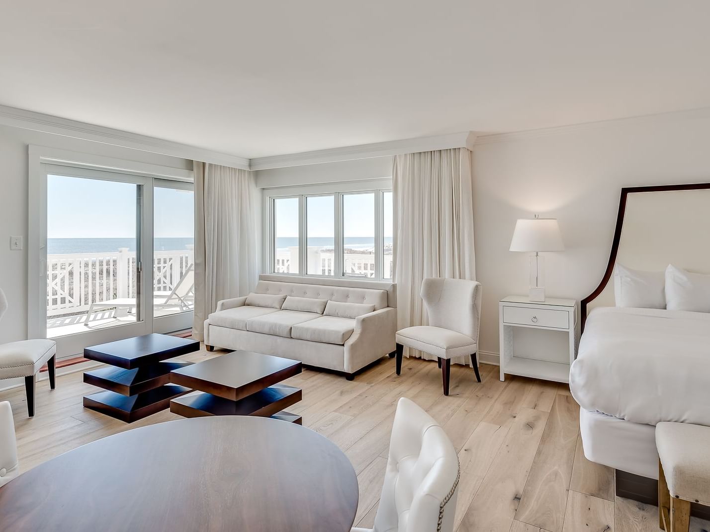 ICONA Avalon Side Oceanfront Luxury King Studio dining, living & sleeping area with large wrap around ocean front balcony