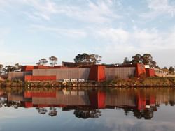 Distant view of Mona Art Museum and the nearby lake near Hotel Grand Chancellor Hobart