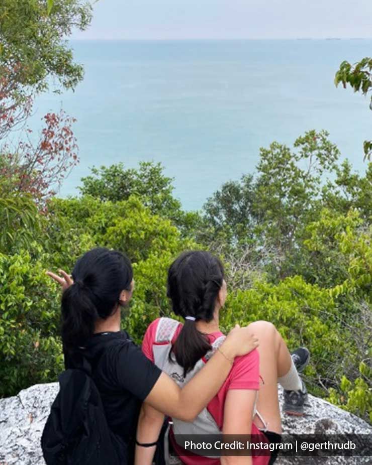 two girls sitting beside each other while looking at the view - Lexis PD