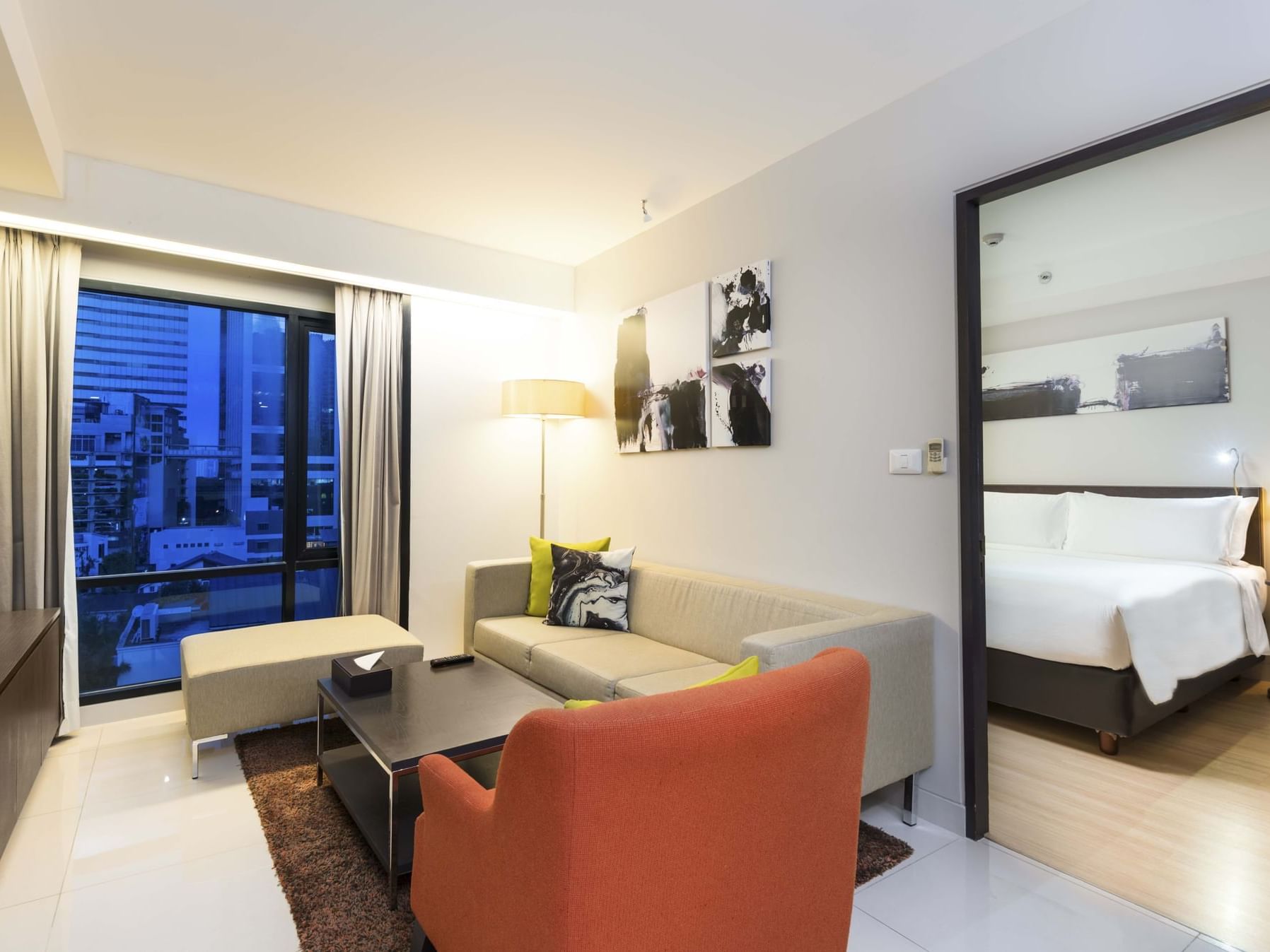 Living area in 2-Bedroom Suite at Maitria Hotel Sukhumvit 18