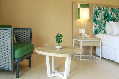 Lounge chair & table in a Room at Playa Blanca Beach Resort