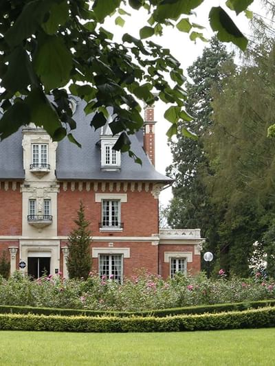 Exterior view of the Hotel & garden area at La Folie Hotel