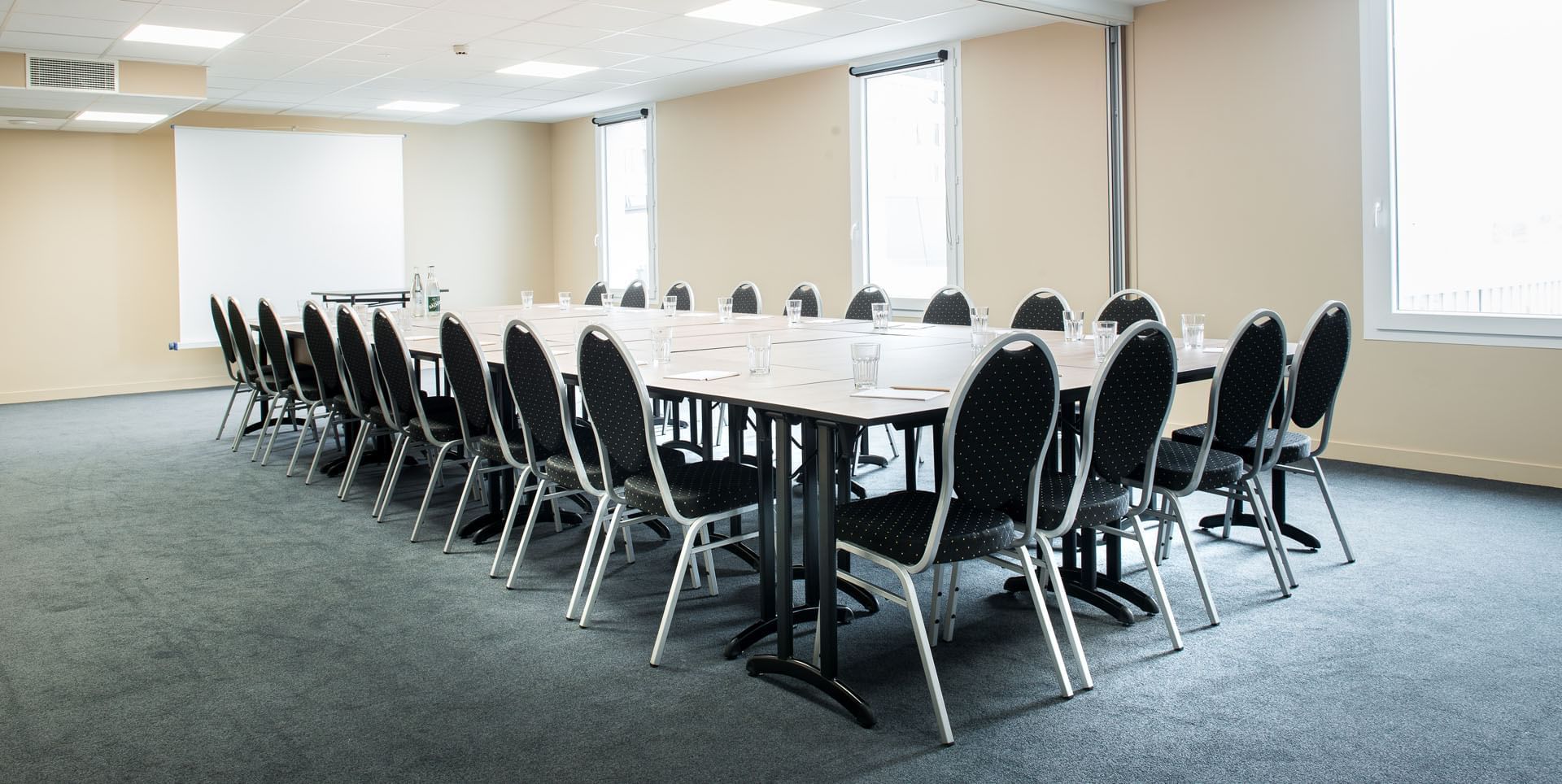 Meeting room with conference setup at Kopster Hotel Lyon