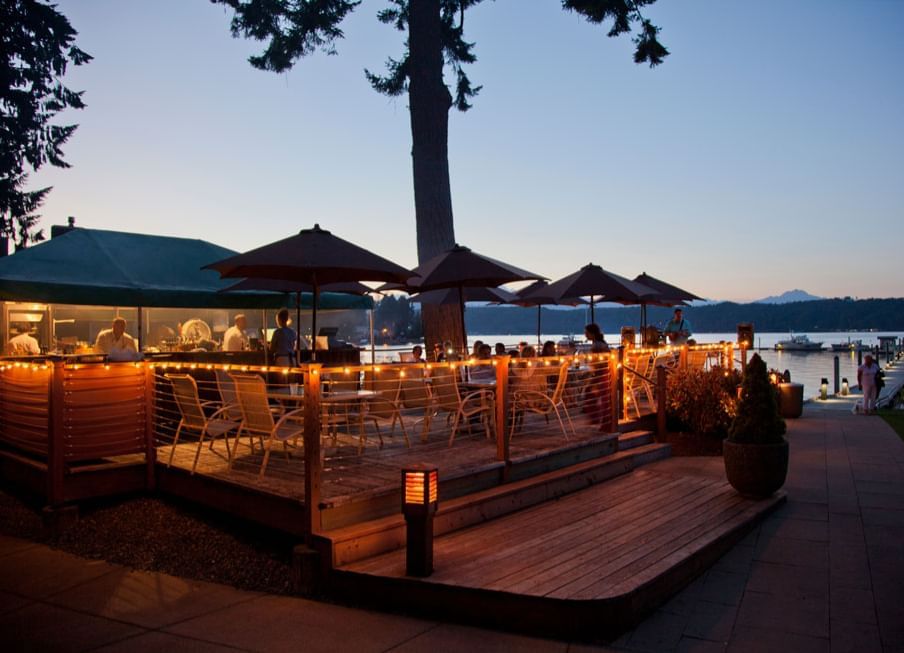 An outdoor restaurant by the canal at Alderbrook Resort & Spa