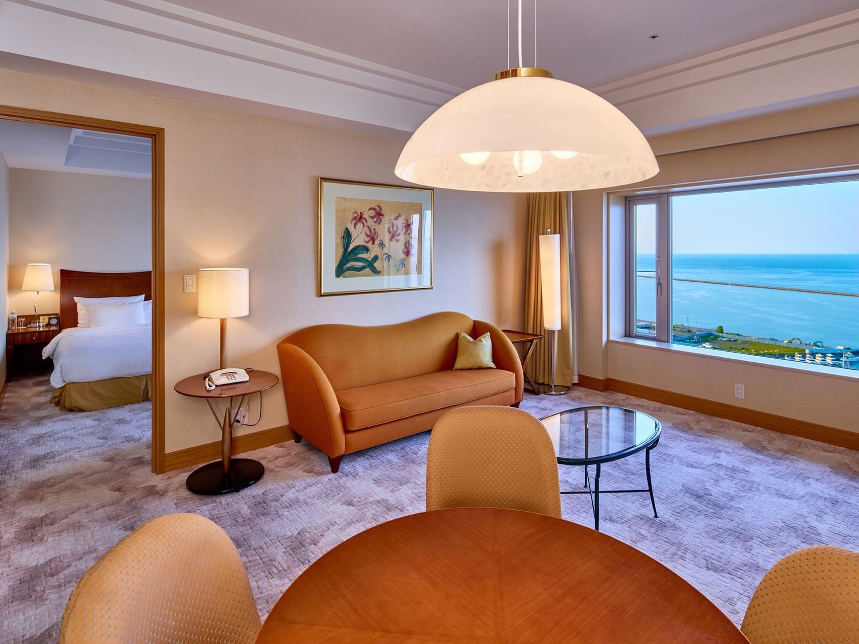 Living room with ocean view in Bay Suite at Grand Park Otaru