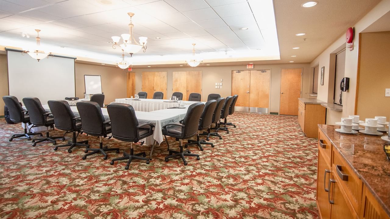 Meeting room with tables and chairs