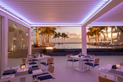 Arranged dining area by the pool, The Morgan Resort Spa Village