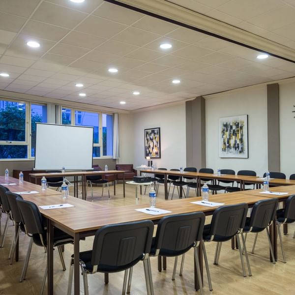 Chair arrangement in a Meeting room at The Originals Hotels