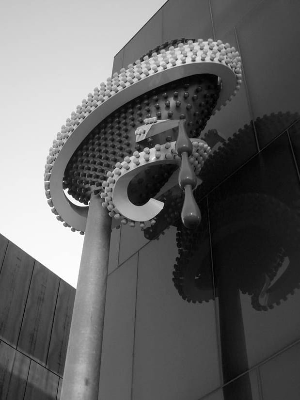 Mcacolorado Denver Museum with a shadow on a glass wall near Warwick Denver