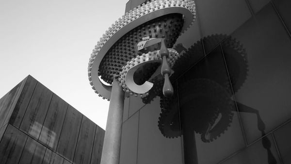 Mcacolorado Denver Museum with a shadow on a glass wall near Warwick Denver