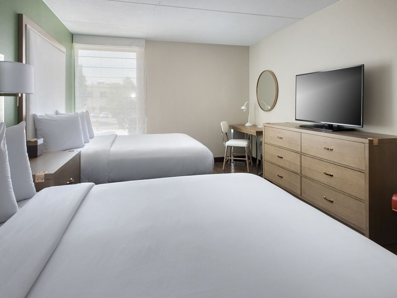Double Queen Room with cozy beds and TV at Hayes Street Hotel