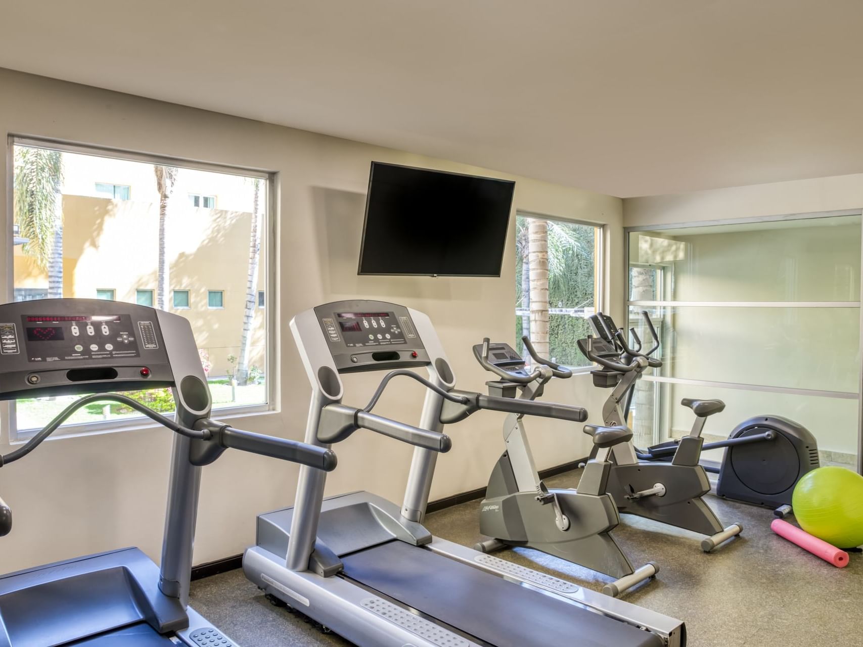 Treadmills & Tv in the Gym Wellness Center at Fiesta Inn Hotels