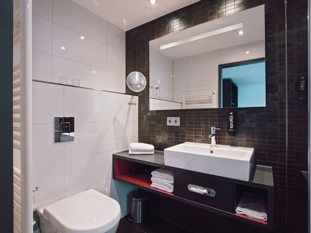 Bathroom vanity in Premium Room at Hotel Berlin Berlin