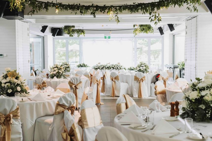 Floral banquet tables arranged at Amora Hotel Melbourne