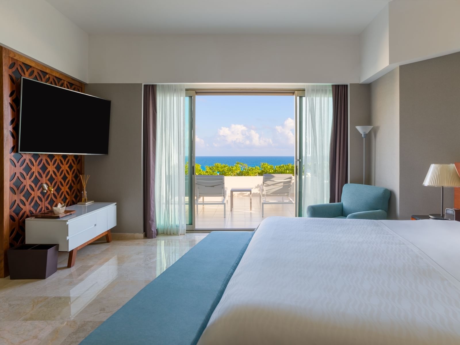 TV, King bed in Aqua Suite at Live Aqua Beach Resort Cancún