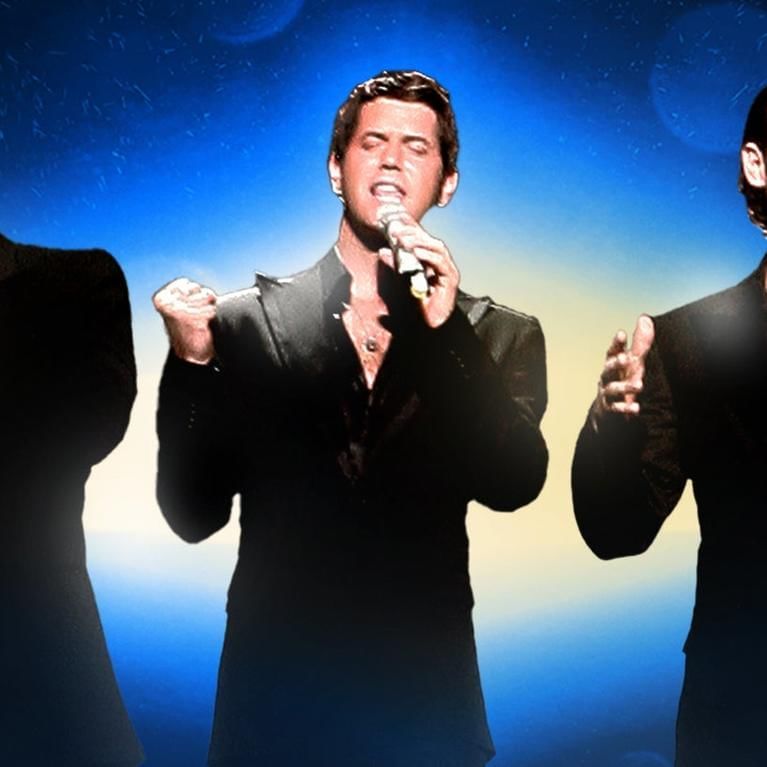 Singer with microphone in front of blue and yellow background