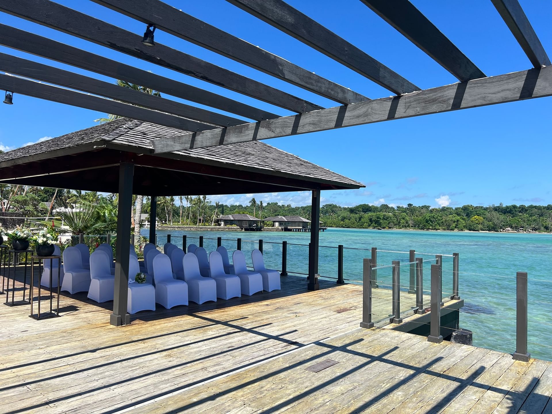 Chairs set up for an event under a canopy at Warwick Le Lagon - Vanuatu Port Vila.