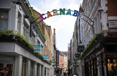 Colorful sign in Carnaby Street near Thistle Hotels