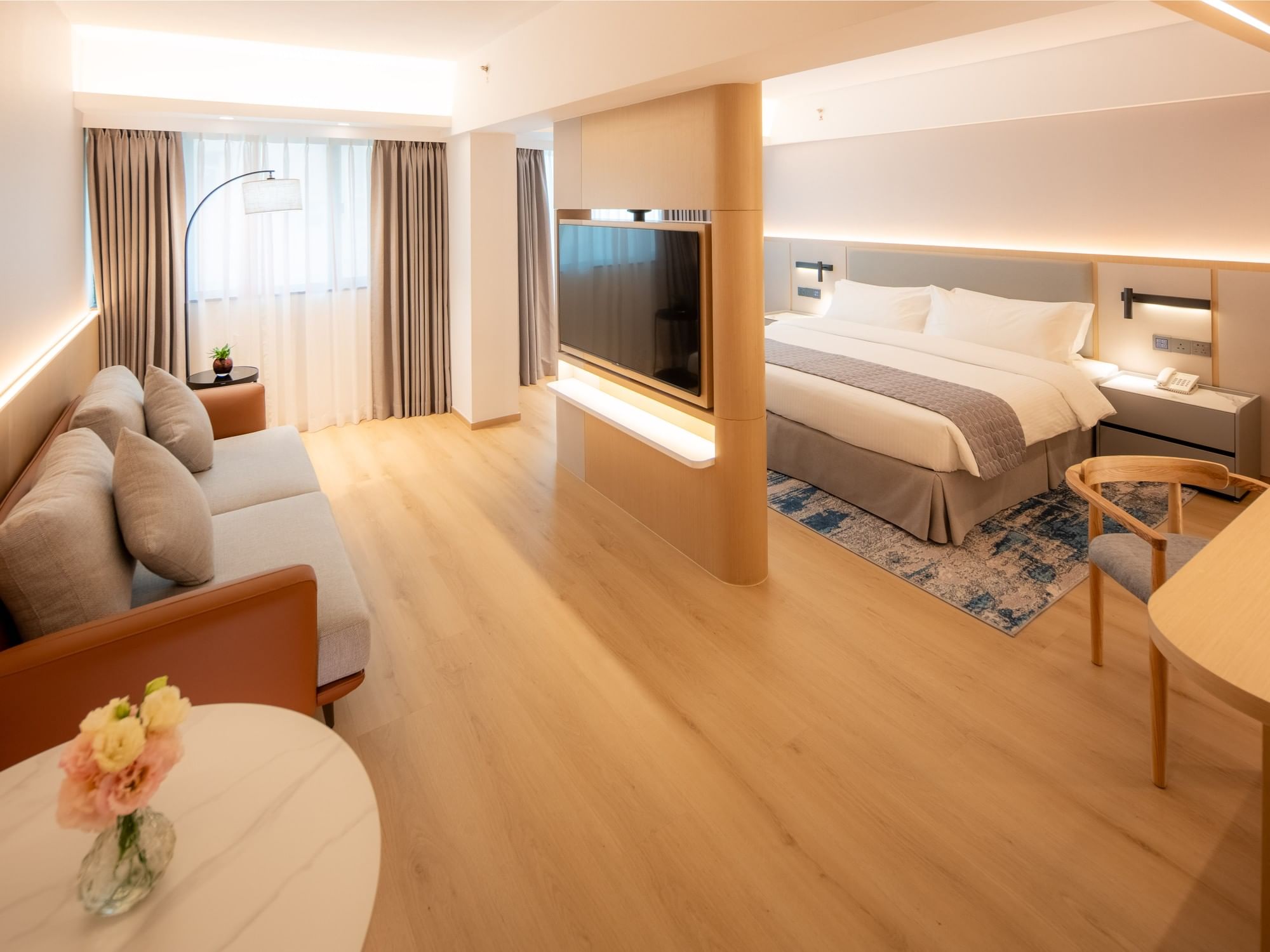 Studio Room, featuring a separate sleeping area and a bright, stylish living room space at Inn Hotel Macau