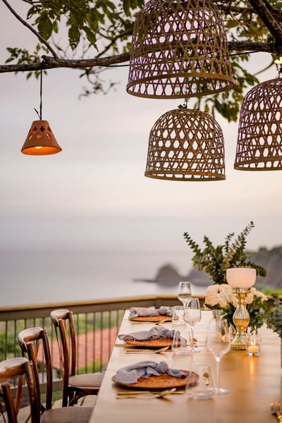 A dining area with a mountain view at Punta Islita Hotel