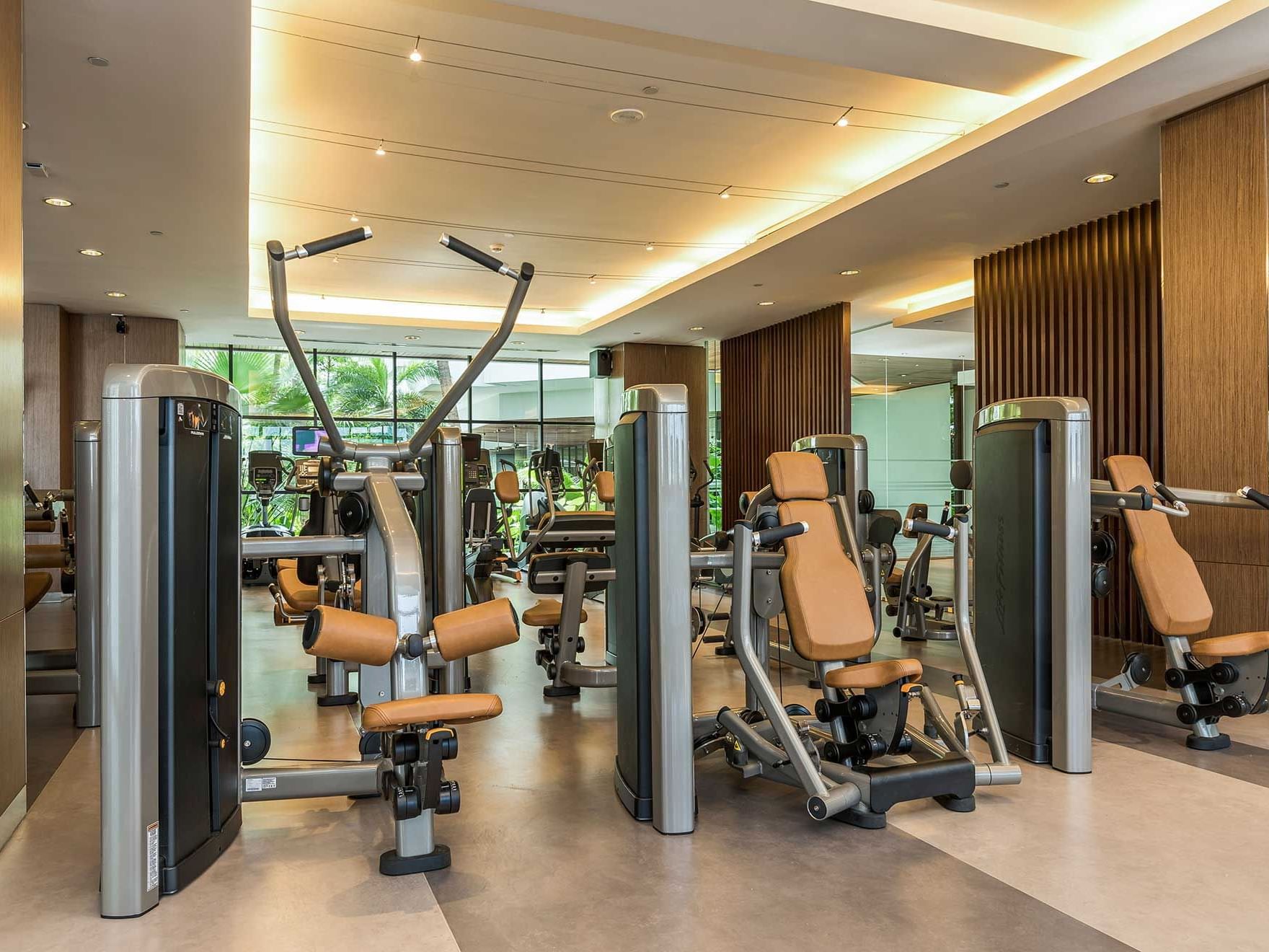 The fully-equipped fitness center at Chatrium Residence Sathon