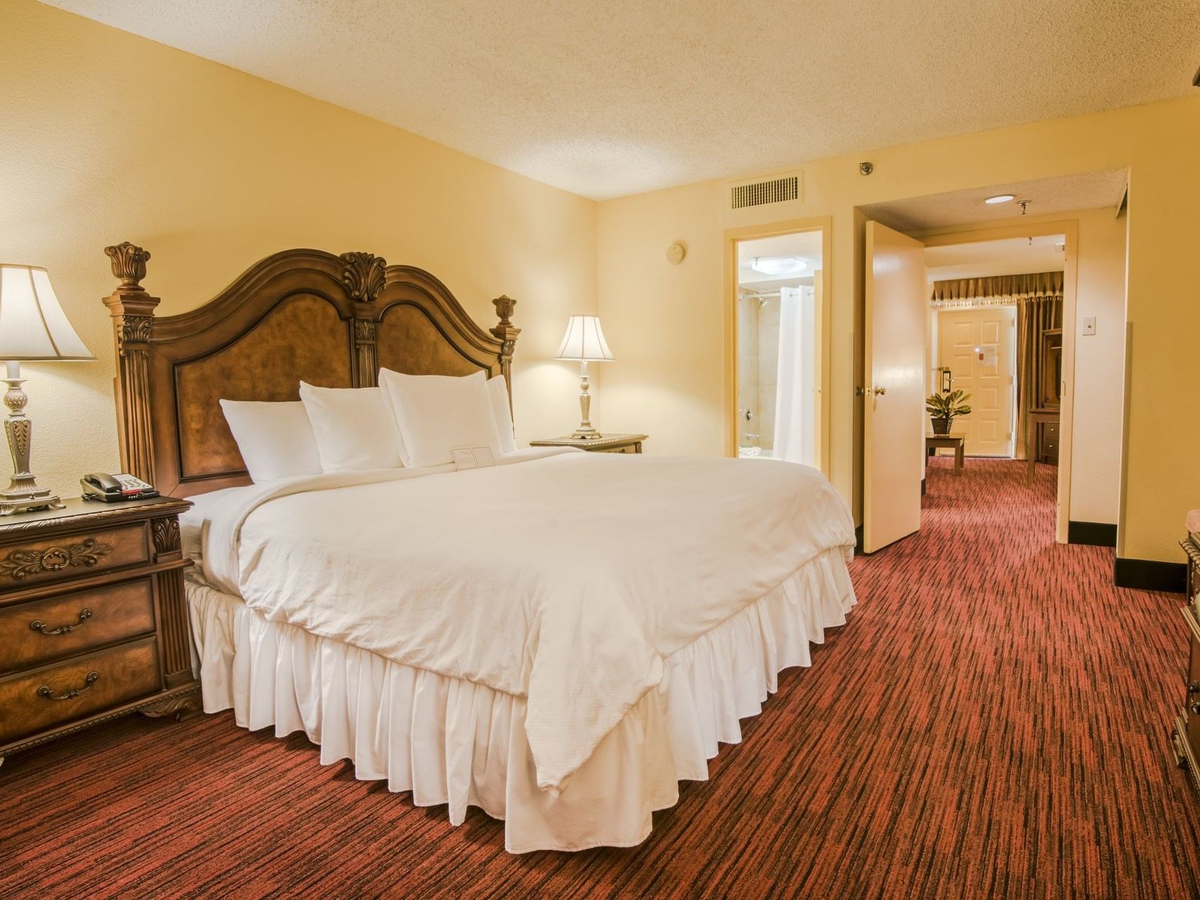 The Dallas Deluxe King with king bed at MCM Elegante Suites