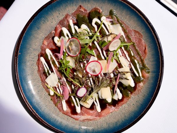 Beef carpaccio, parmesan and arugula